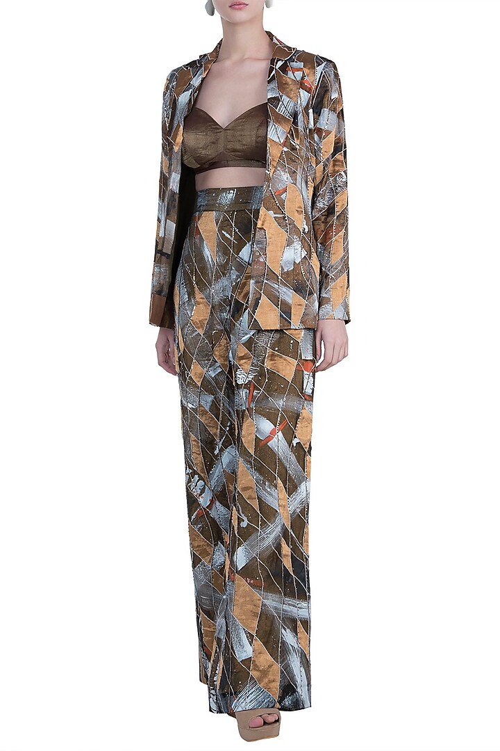 Black and gold jacket and pants available only at Pernia's Pop Up Shop.