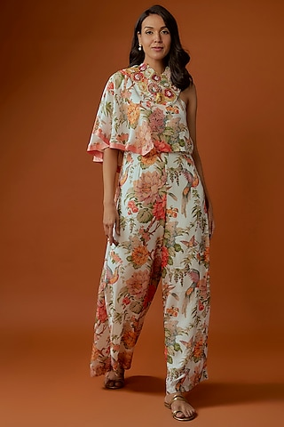 Off-White Sequins Net Printed & Embroidered One-Shoulder Jumpsuit With Cape by Divya Kanakia