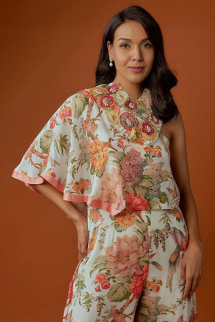 Off-White Sequins Net Printed & Embroidered One-Shoulder Jumpsuit With Cape by Divya Kanakia at Pernia's Pop Up Shop