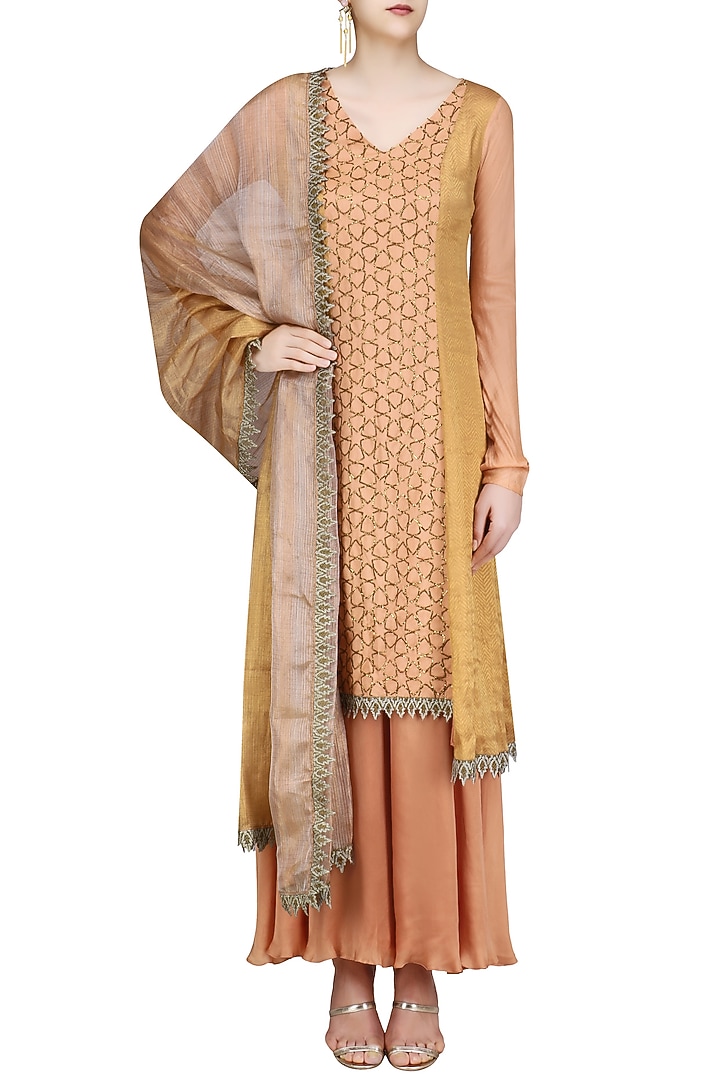 Flesh color assymetrical banarasi and moonga embroidered kurta set available only at Pernia's Pop Up Shop.