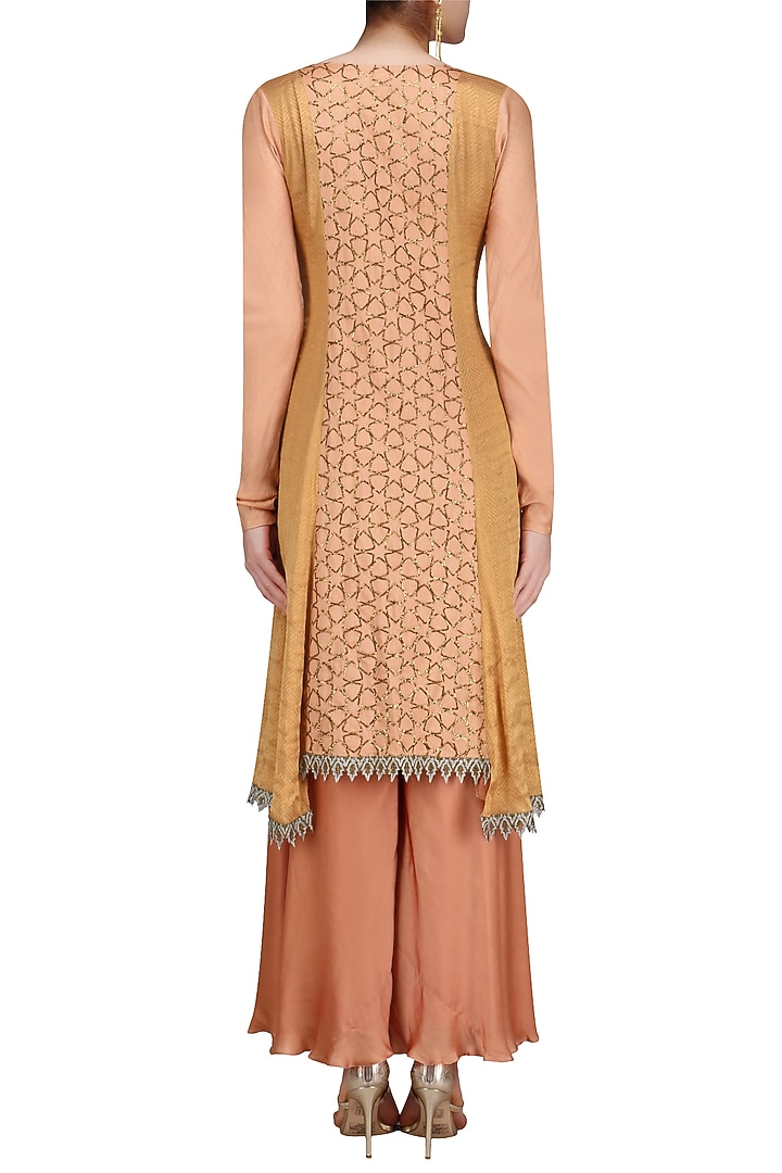 Flesh color assymetrical banarasi and moonga embroidered kurta set available only at Pernia's Pop Up Shop.