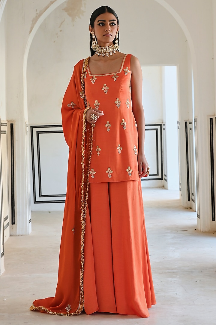 Orange Raw Satin Floral Embroidered Kurta Set by Ease at Pernia's Pop Up Shop