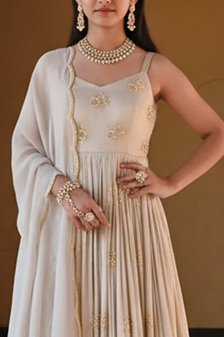 Beige Raw Satin Floral Booti Embroidered Anarkali Set For Girls by Ease kids at Pernia's Pop Up Shop