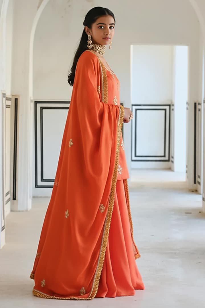 Orange Raw Satin Floral Booti Embroidered Kurta Set For Girls by Ease kids at Pernia's Pop Up Shop