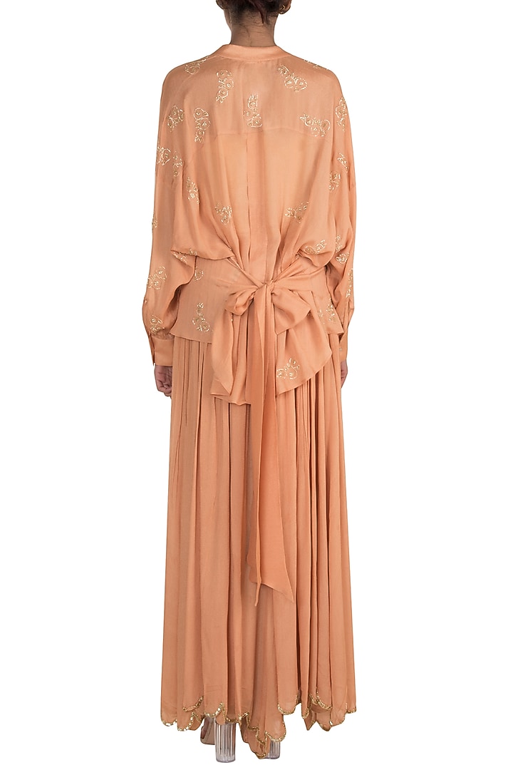 Peach Embroidered Top With Flared Pants by Ease at Pernia's Pop Up Shop