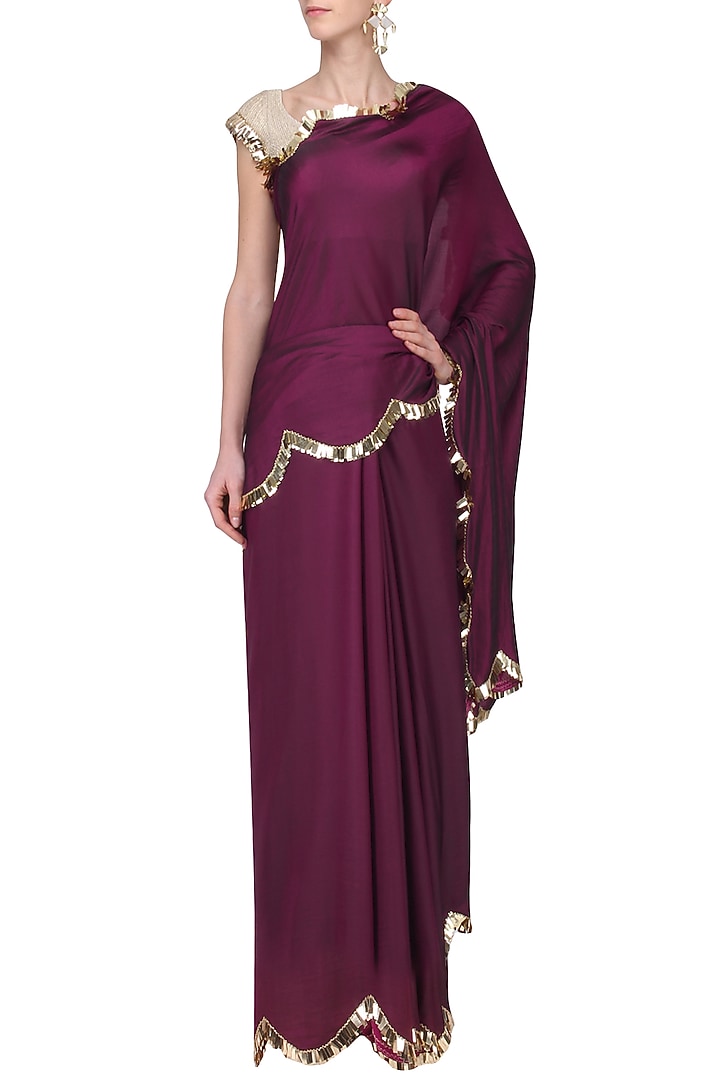 Wine Two tone tasseled saree and Gold blouse available only at Pernia's Pop Up Shop.