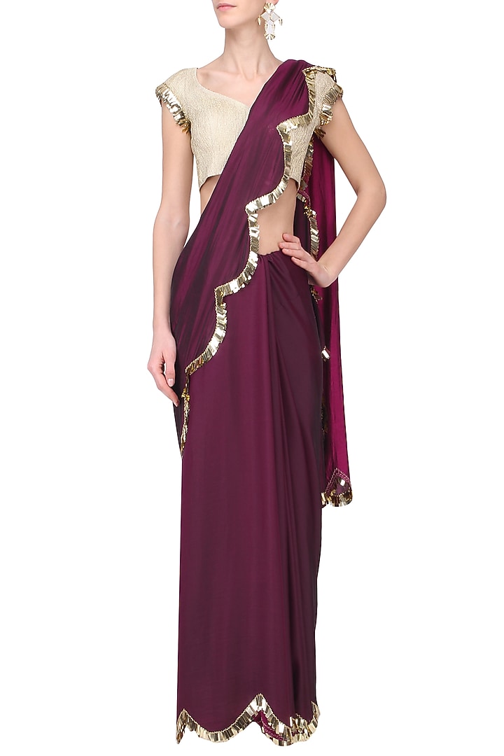 Wine Two tone tasseled saree and Gold blouse available only at Pernia's Pop Up Shop.