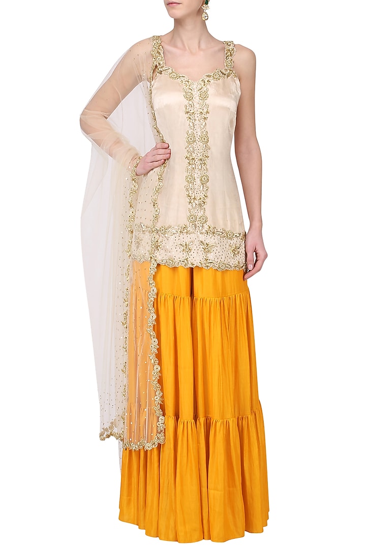 Off White and Mango yellow embroidered Sharara setavailable only at Pernia's Pop Up Shop.