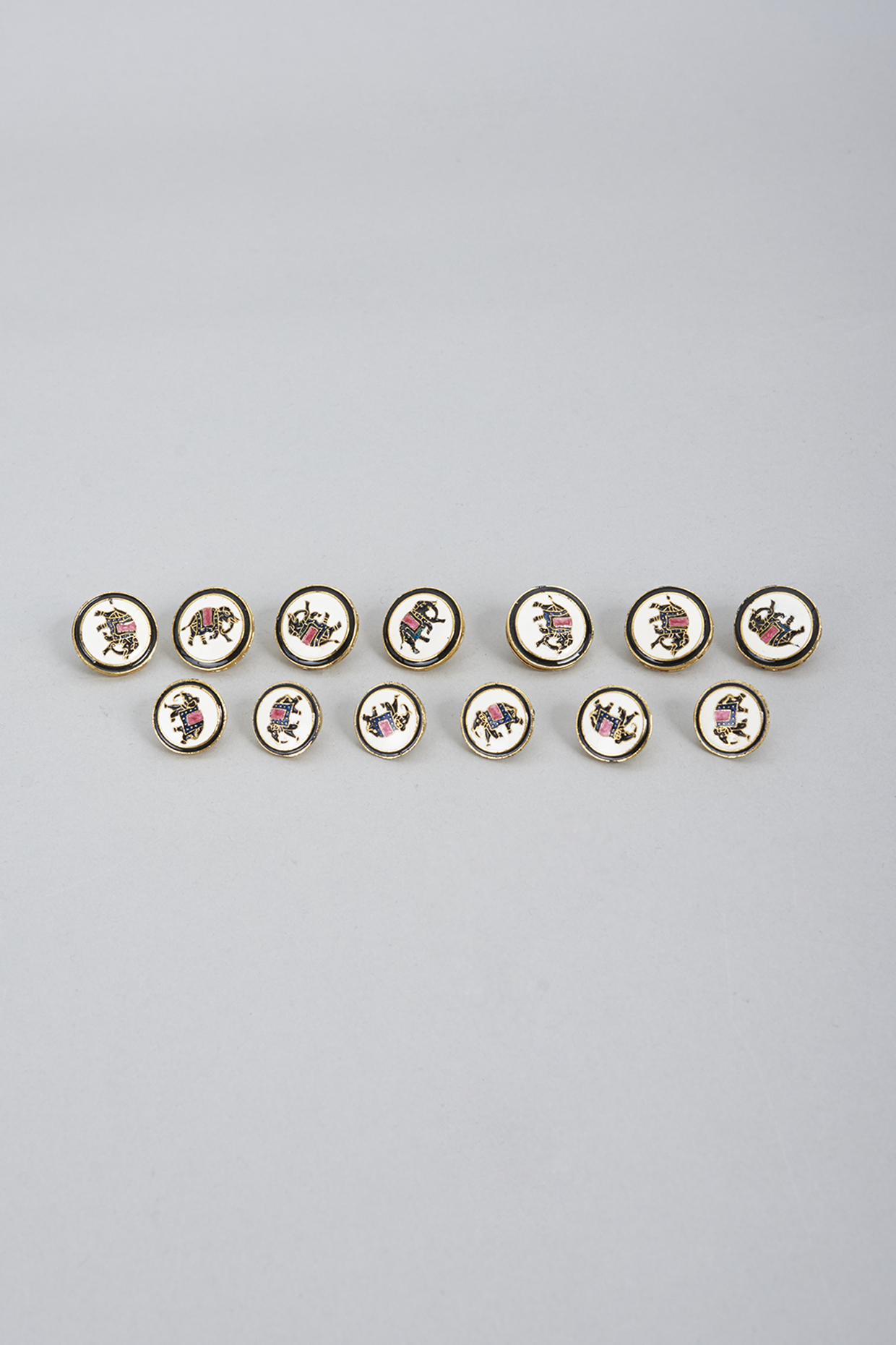 White Brass Handcrafted Meenakari Buttons (Set of 13) by Ekam by Manish Gupta at Pernia's Pop Up Shop