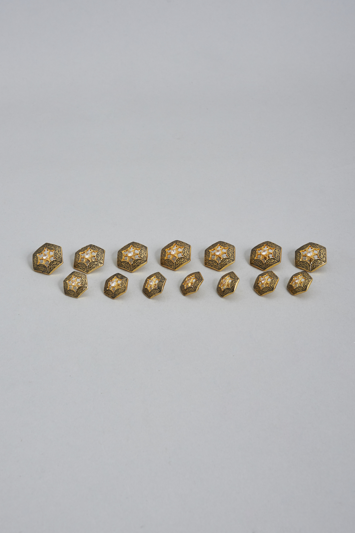 Dull Gold Brass Meenakari Buttons (Set of 13) by Ekam by Manish Gupta at Pernia's Pop Up Shop
