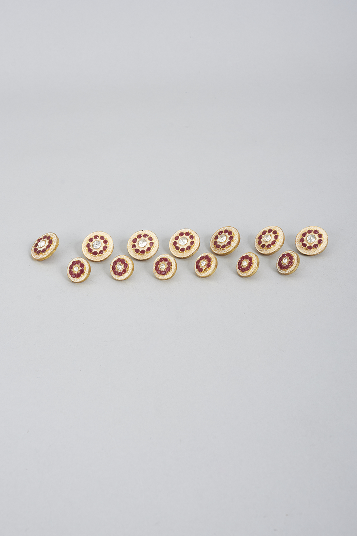 Red & White Brass Meenakari Buttons (Set of 13) by Ekam by Manish Gupta at Pernia's Pop Up Shop