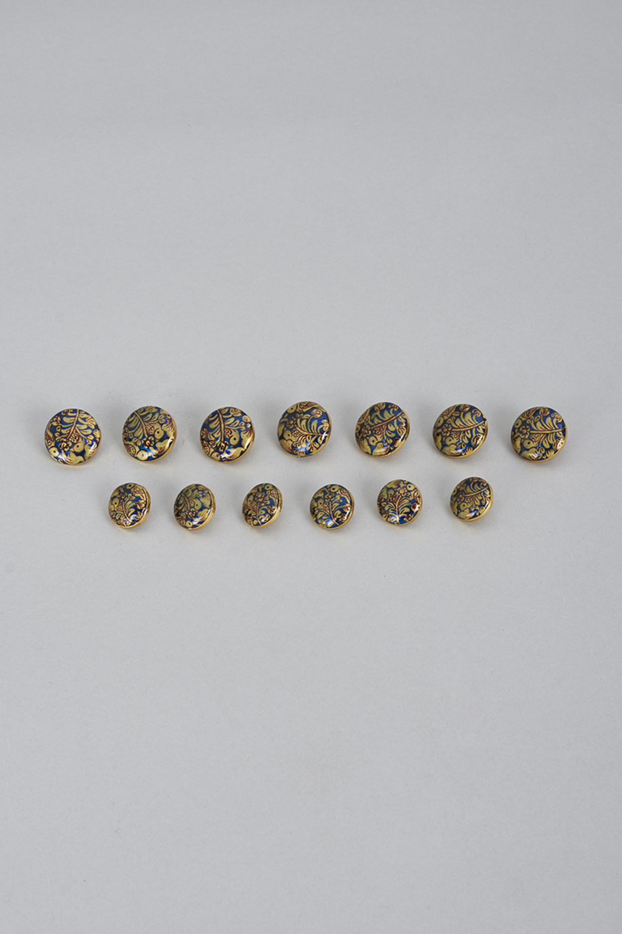 Multi-Colored Brass Meenakari Buttons (Set of 13) by Ekam by Manish Gupta at Pernia's Pop Up Shop