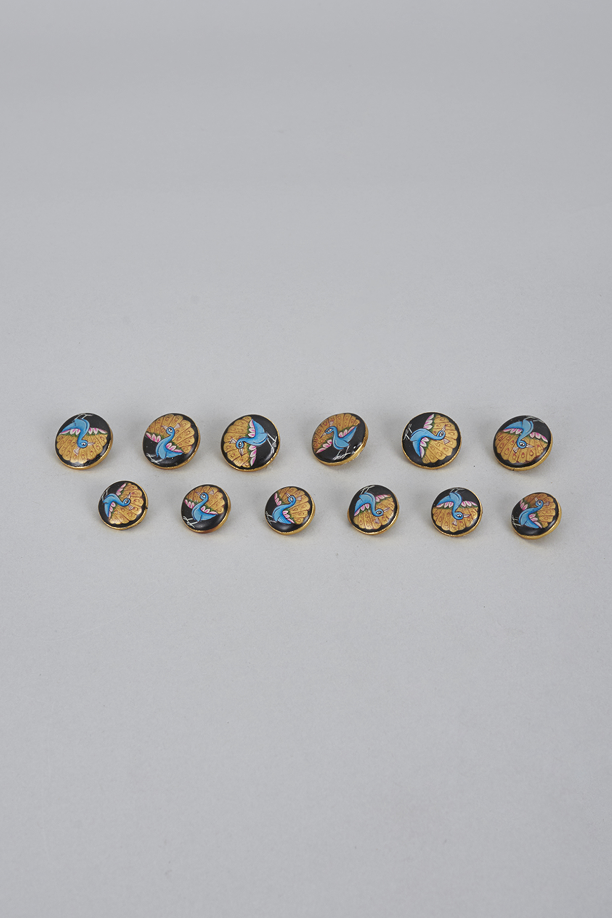 Multi-Colored Brass Meenakari Buttons (Set of 13) by Ekam by Manish Gupta at Pernia's Pop Up Shop