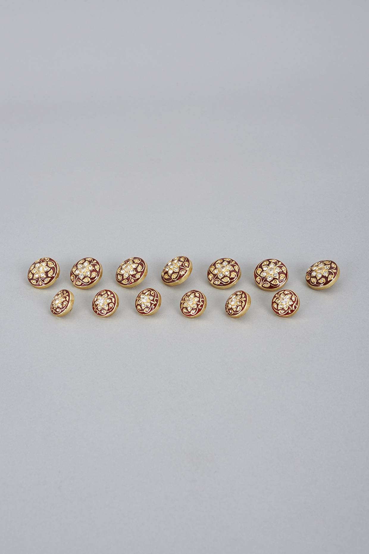 Red Meenakari Buttons (Set of 13) by Ekam by Manish Gupta at Pernia's Pop Up Shop
