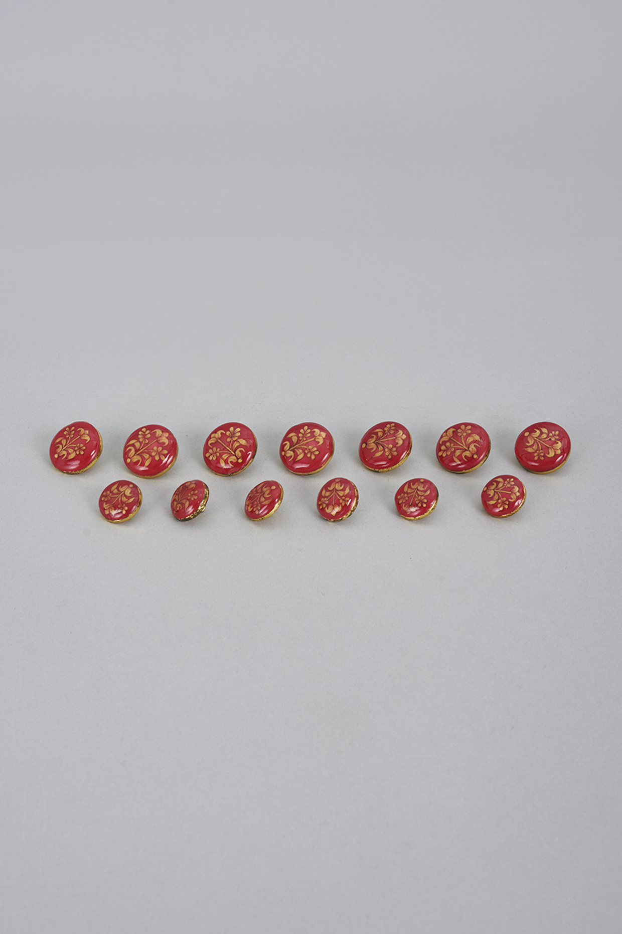 Red & Gold Meenakari Buttons (Set of 13) by Ekam by Manish Gupta at Pernia's Pop Up Shop