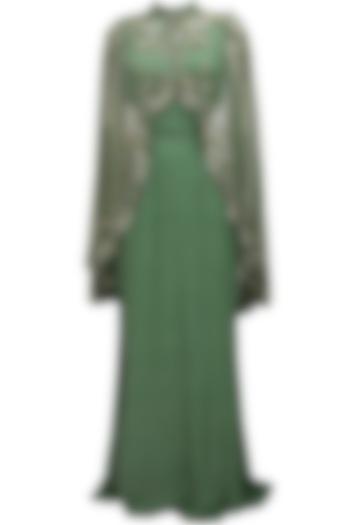 Green cutout goddess gown with embroidered high low sheer cape by Elysian By Gitanjali