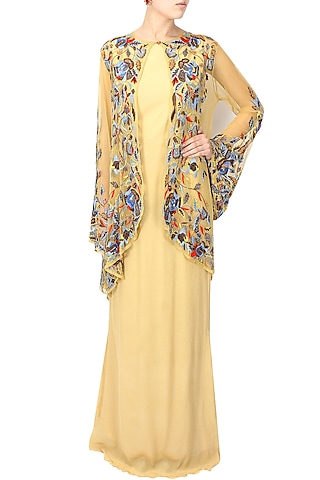 Beige queen bee gown with floral embroidered sheer cape by Elysian By Gitanjali