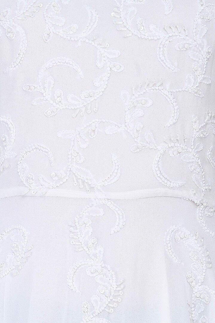 Elysian by Gitanjali presents White beaded thread hand embroidered peplum top available only at Pernia's Pop Up Shop.