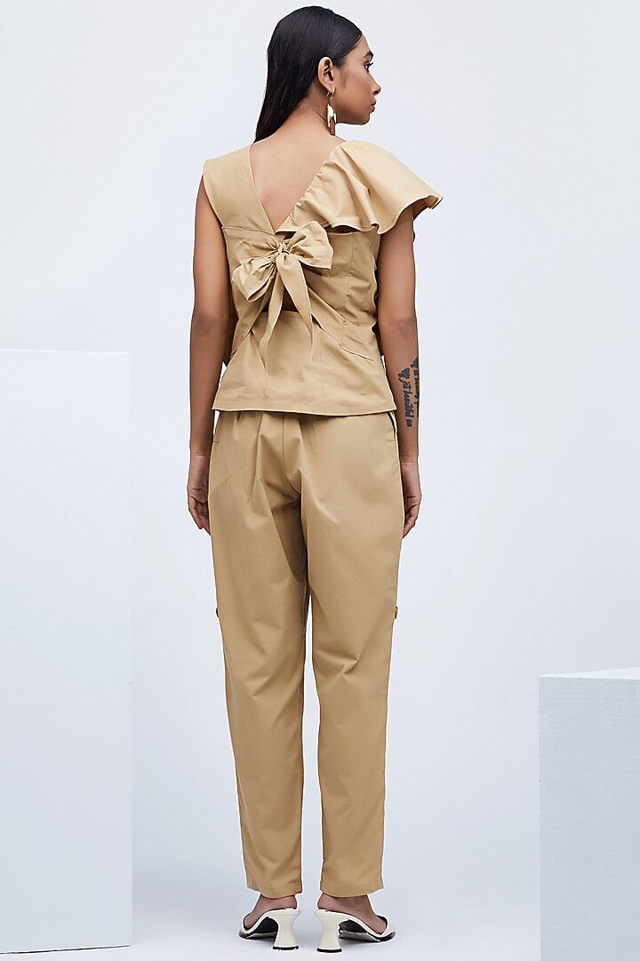 Beige Eched Pants With Pockets by Echo Studio at Pernia's Pop Up Shop