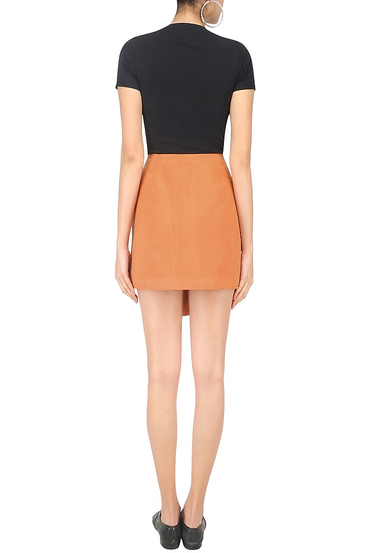 Orange suede skirt available only at Pernia's Pop Up Shop.