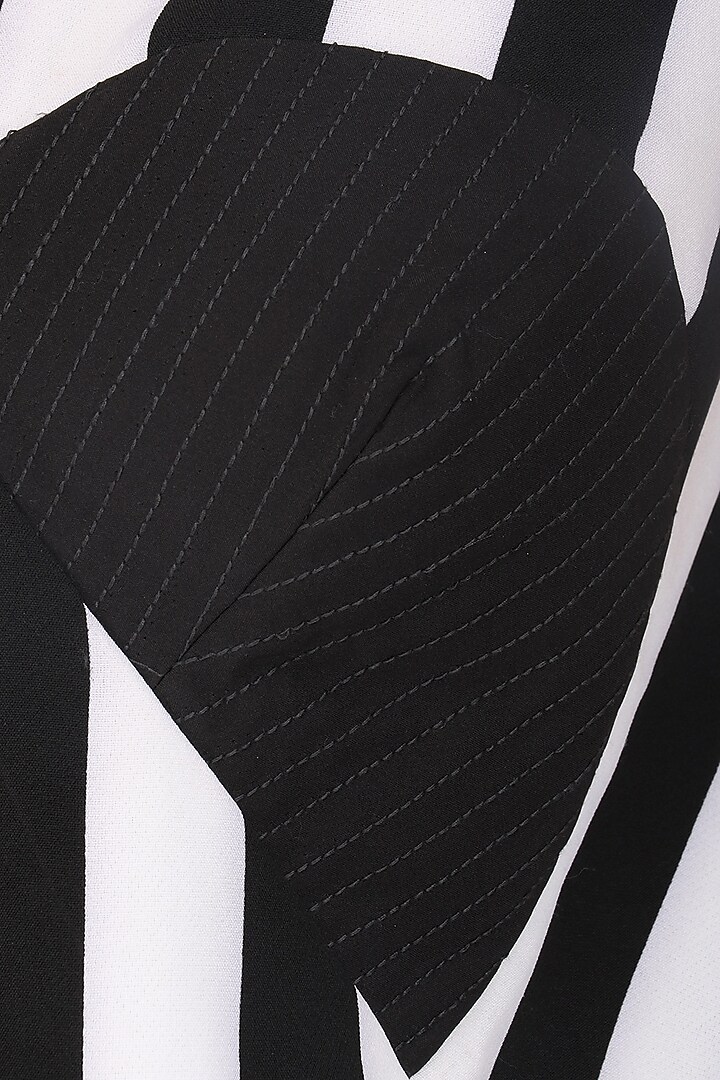 Black and white striped asymmetrical top available only at Pernia's Pop Up Shop.