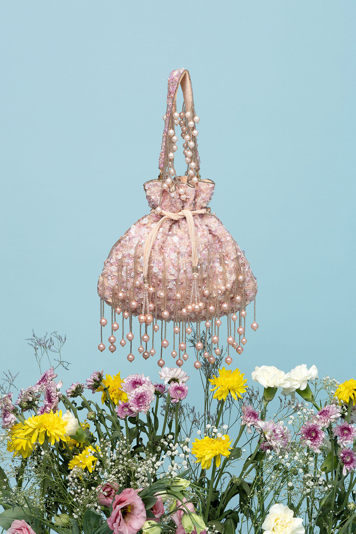 Rosegold Velvet Crystal Embellished Potli Bag by EENA at Pernia's Pop Up Shop