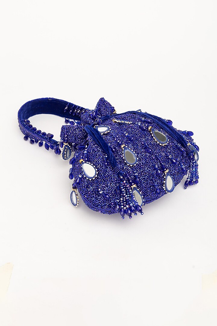 Blue Velvet Mirror Embellished Potli Bag by EENA at Pernia's Pop Up Shop
