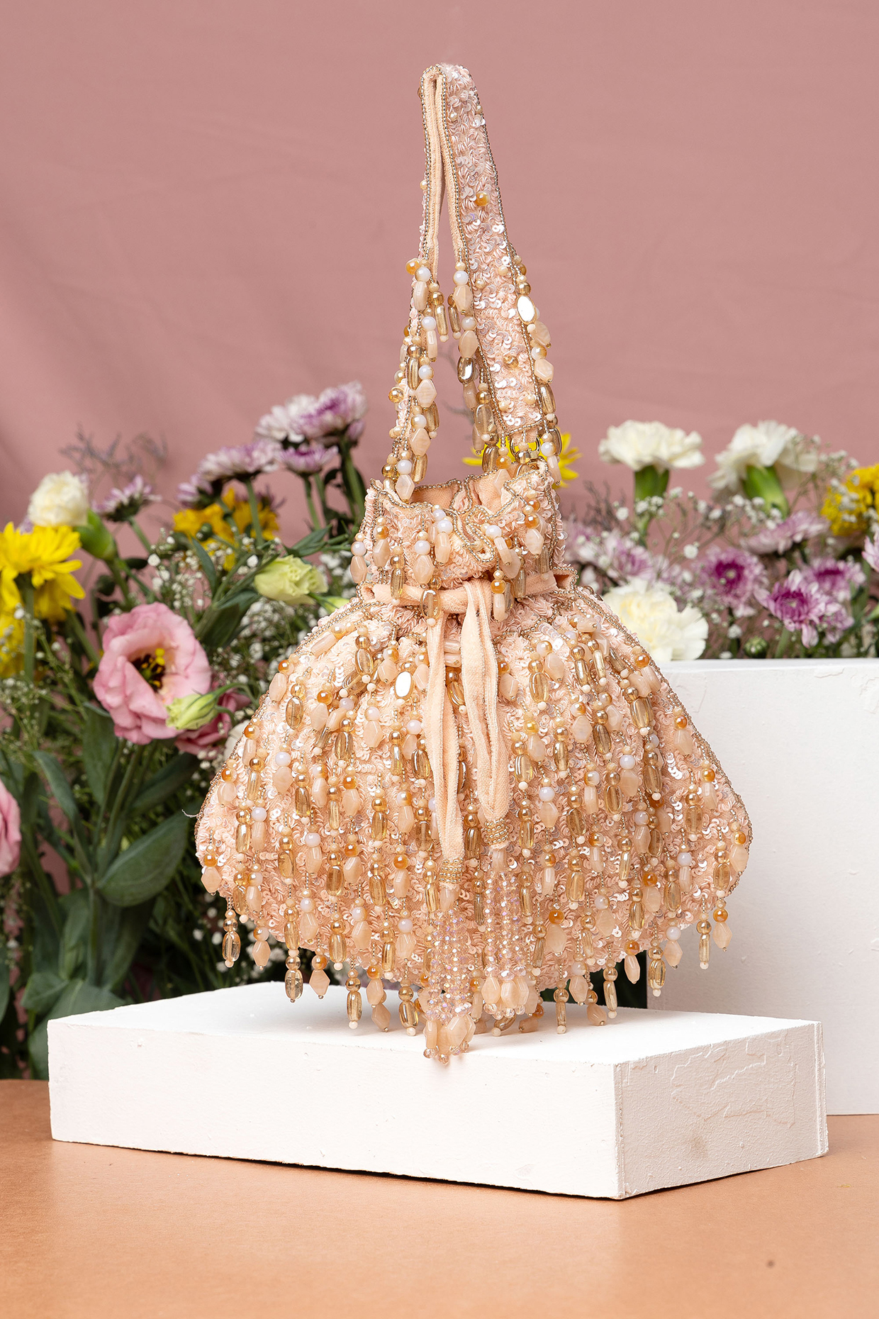 Pink Velvet Beadwork Potli Bag by EENA at Pernia's Pop Up Shop