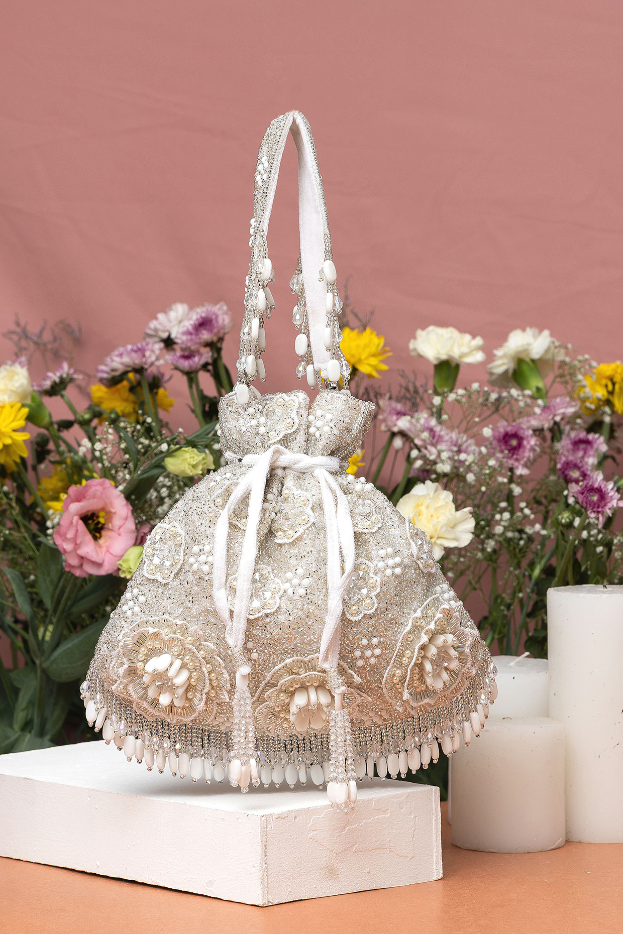 White Velvet Bead Embellished Potli Bag by EENA at Pernia's Pop Up Shop