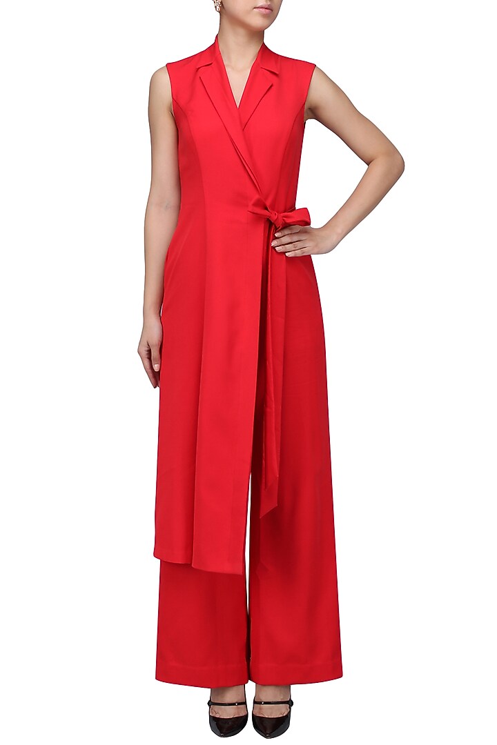 Red draped jumpsuit available only at Pernia's Pop Up Shop.