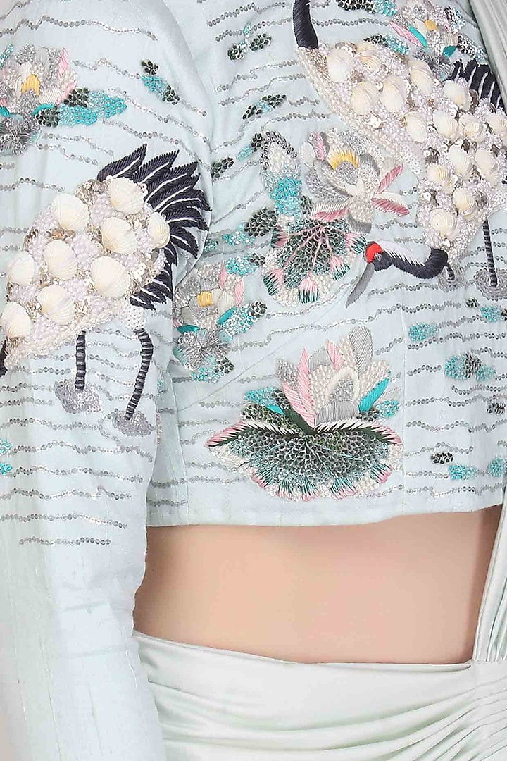 Aqua pleated lycra saree with birds embroidered blouse available only at Pernia's Pop Up Shop.