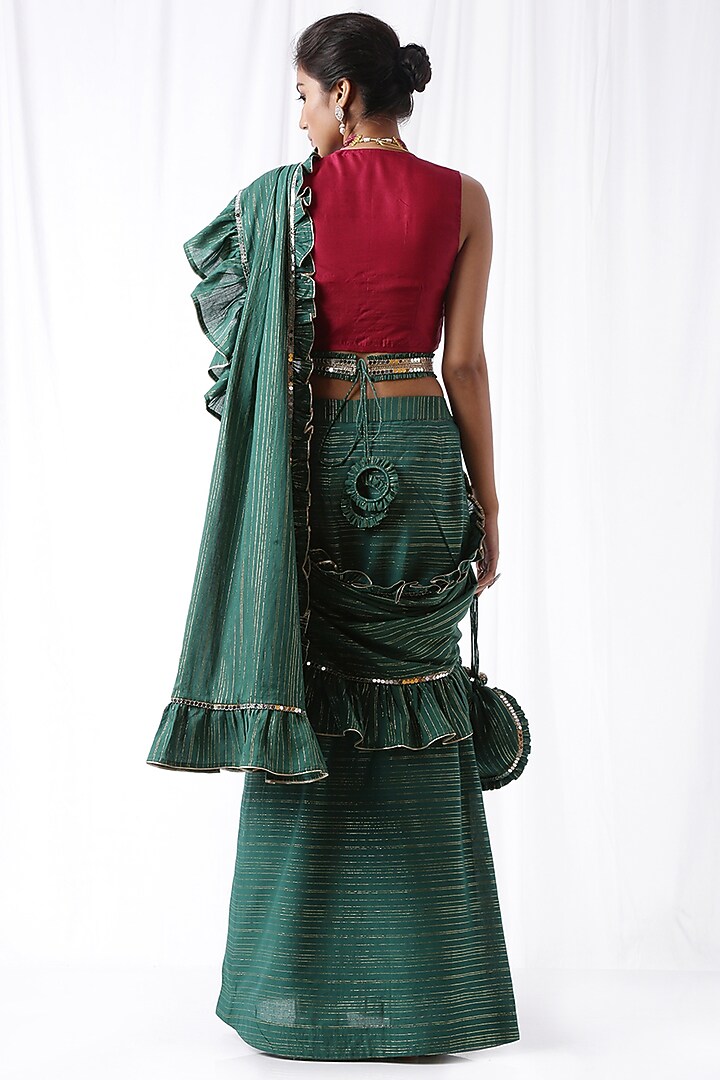 Bottle Green Ruffled Zip-Up Party Wear Saree With Potli Bag by Ekanya at Pernia's Pop Up Shop