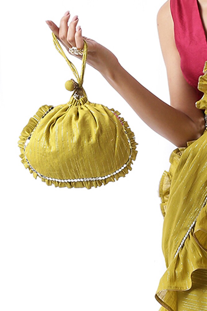 Green Ruffled Zip-Up Party Wear Saree Set With Potli Bag by Ekanya at Pernia's Pop Up Shop