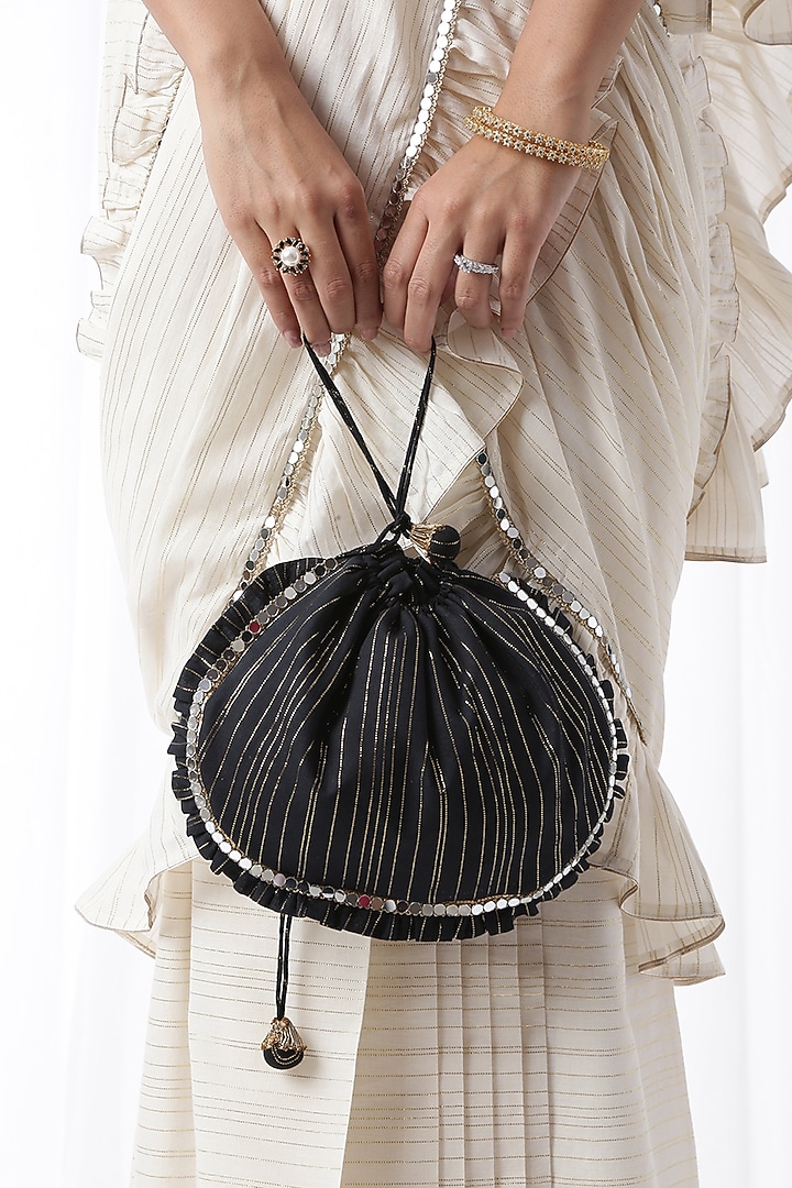 Off-White Ruffled Zip-Up Party Wear Saree Set With Potli Bag by Ekanya at Pernia's Pop Up Shop