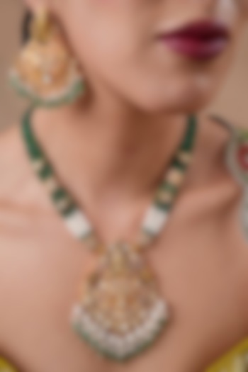 Gold Finish Moissanite Polki & Emerald Beaded Long Pendant Necklace Set by EKATHVA JAIPUR at Pernia's Pop Up Shop