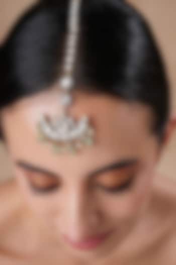 Gold Finish Moissanite Polki & Aqua Stone Maangtikka by EKATHVA JAIPUR at Pernia's Pop Up Shop