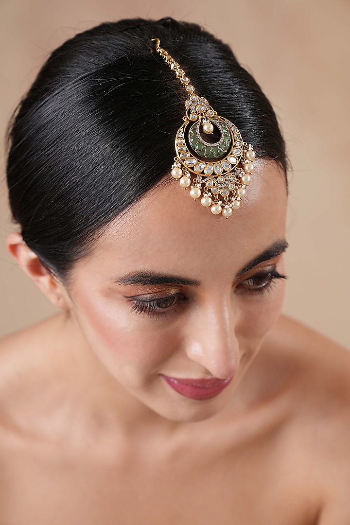 Gold Finish Kundan Polki & Emerald Stone Meenakari Maangtikka by EKATHVA JAIPUR at Pernia's Pop Up Shop