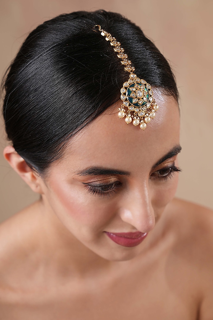 Gold Finish Kundan Polki & Emerald Stone Meenakari Maangtikka by EKATHVA JAIPUR at Pernia's Pop Up Shop