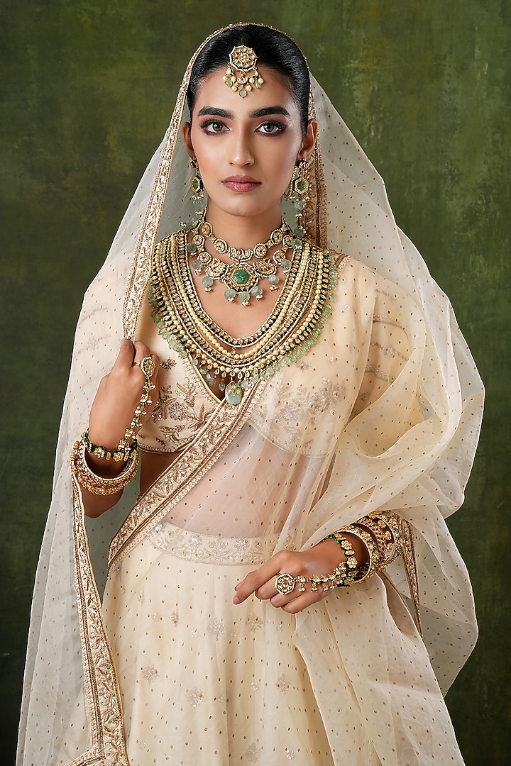 Gold Finish Kundan Polki & Green Stone Necklace Set by EKATHVA JAIPUR at Pernia's Pop Up Shop