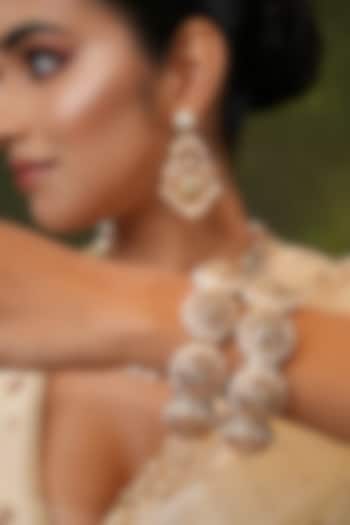 Gold Finish Kundan Polki Bangles (Set Of 2) by EKATHVA JAIPUR at Pernia's Pop Up Shop