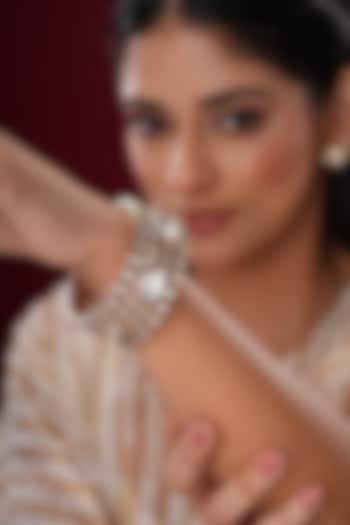 Gold Finish Kundan Polki Bangles (Set Of 2) by EKATHVA JAIPUR at Pernia's Pop Up Shop