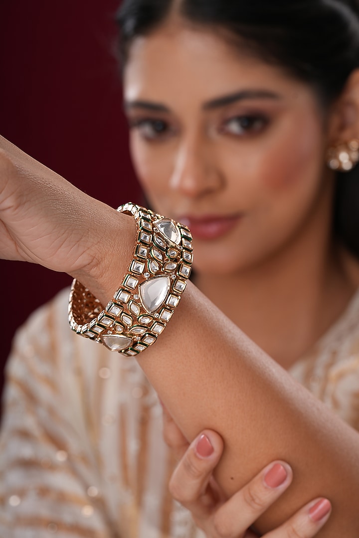 Gold Finish Kundan Polki Bangles (Set Of 2) by EKATHVA JAIPUR at Pernia's Pop Up Shop