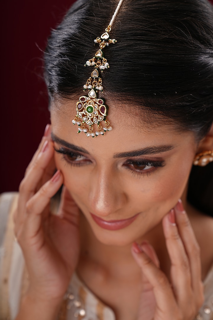 Gold Finish Kundan Polki & Green Stone Floral Maangtikka by EKATHVA JAIPUR at Pernia's Pop Up Shop