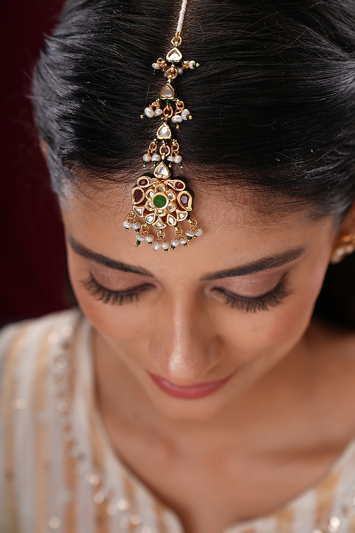 Gold Finish Kundan Polki & Green Stone Floral Maangtikka by EKATHVA JAIPUR at Pernia's Pop Up Shop