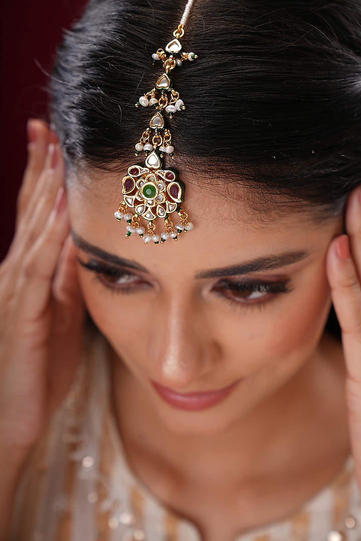 Gold Finish Kundan Polki & Green Stone Floral Maangtikka by EKATHVA JAIPUR at Pernia's Pop Up Shop