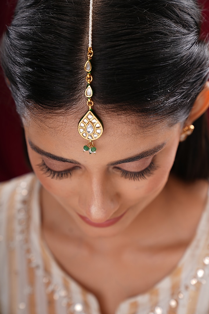 Gold Finish Kundan Polki & Green Stone Maangtikka by EKATHVA JAIPUR at Pernia's Pop Up Shop