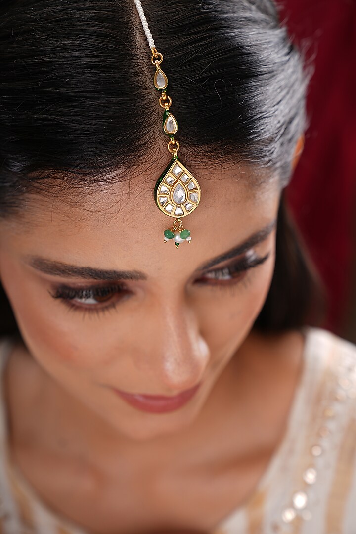 Gold Finish Kundan Polki & Green Stone Maangtikka by EKATHVA JAIPUR at Pernia's Pop Up Shop