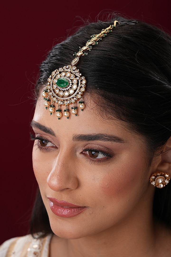 Gold Finish Kundan Polki & Green Stone Maangtikka by EKATHVA JAIPUR at Pernia's Pop Up Shop