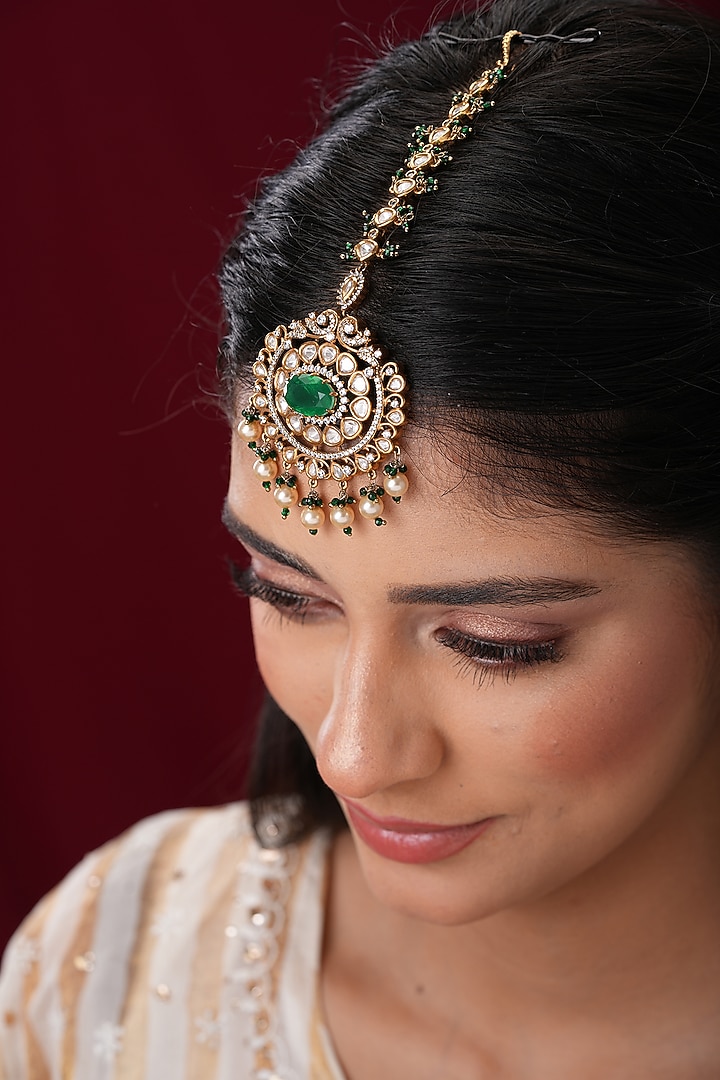 Gold Finish Kundan Polki & Green Stone Maangtikka by EKATHVA JAIPUR at Pernia's Pop Up Shop