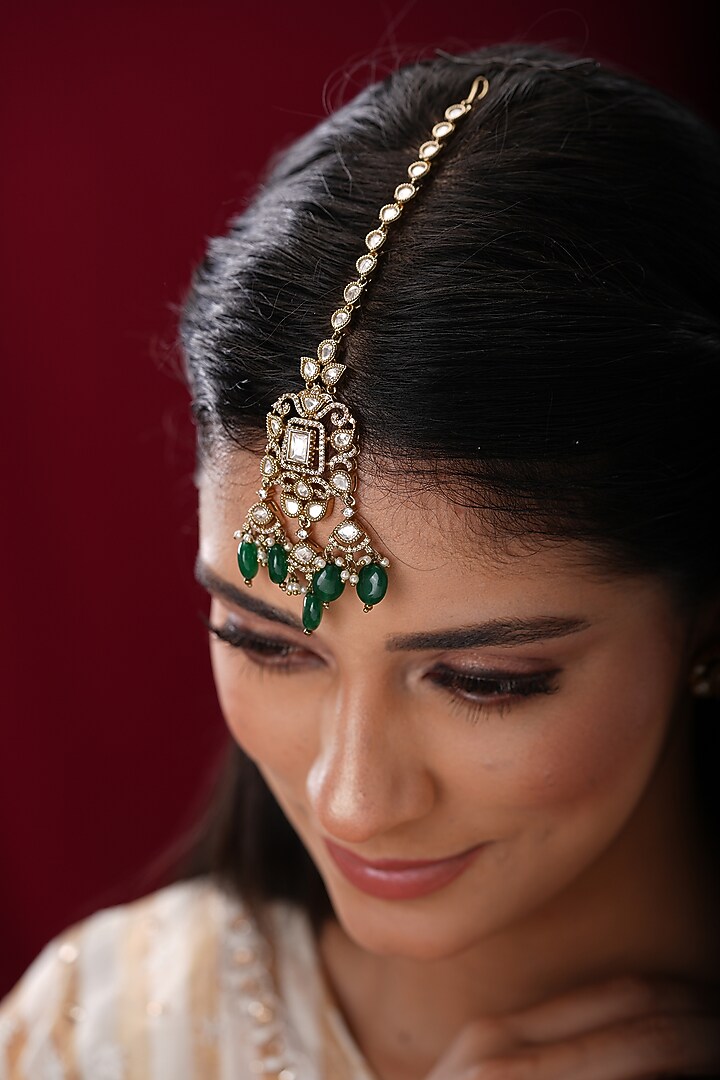 Gold Finish Kundan Polki & Green Stone Maangtikka by EKATHVA JAIPUR at Pernia's Pop Up Shop